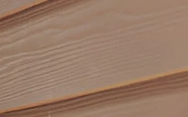 Lap siding boards installed across an exterior wall