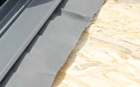Skylight curb frame set into roof membrane and decking